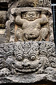 Prambanan - Candi Lara Jonggrang, makara figure as dwarapala at foot of the door 